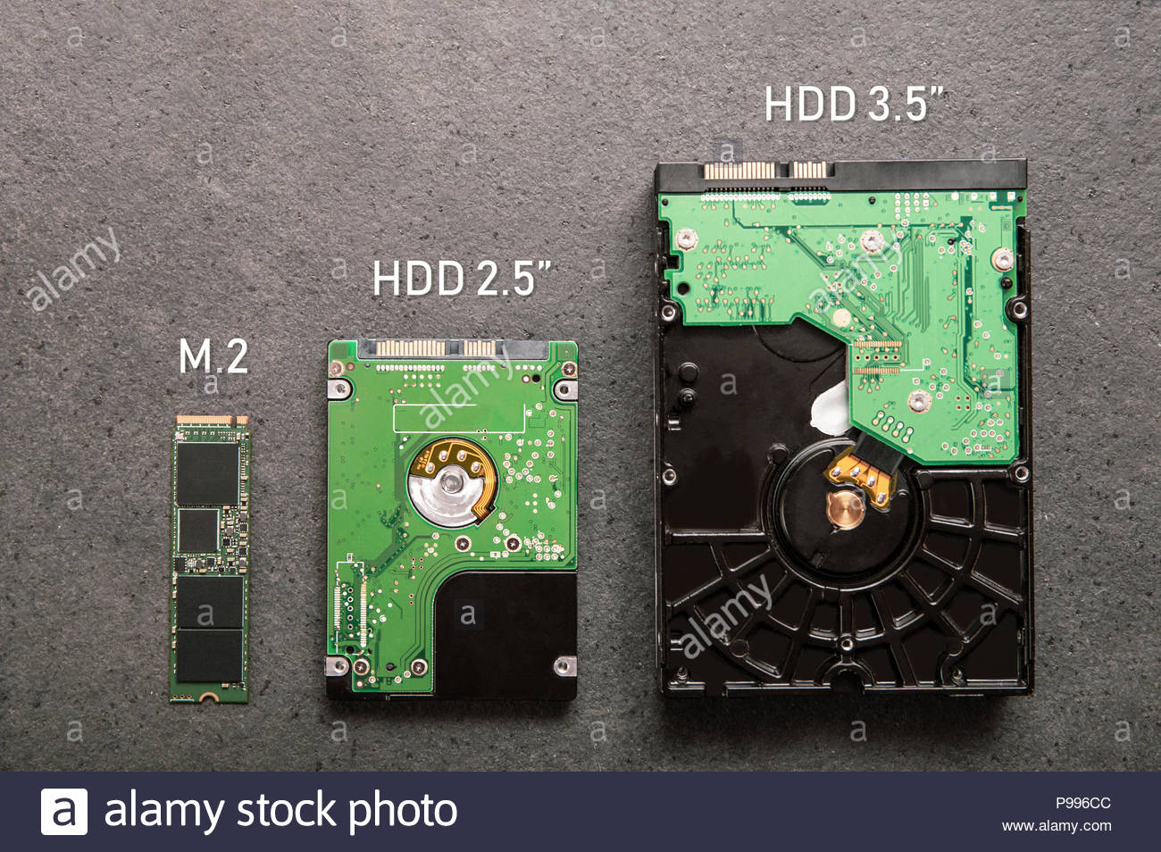 three-drives-arranged-on-a-stone-slab-comparison-of-ssd-m2-drive-with-hdd-25-and-35-P996CC.jpg